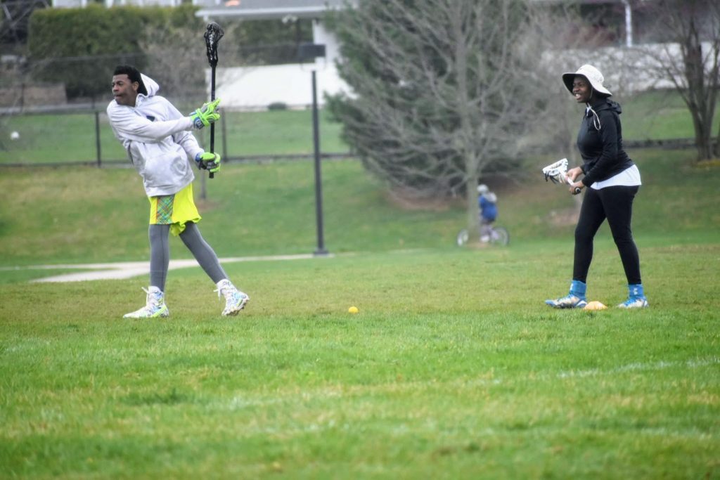 African American Kids playing Lacrosse