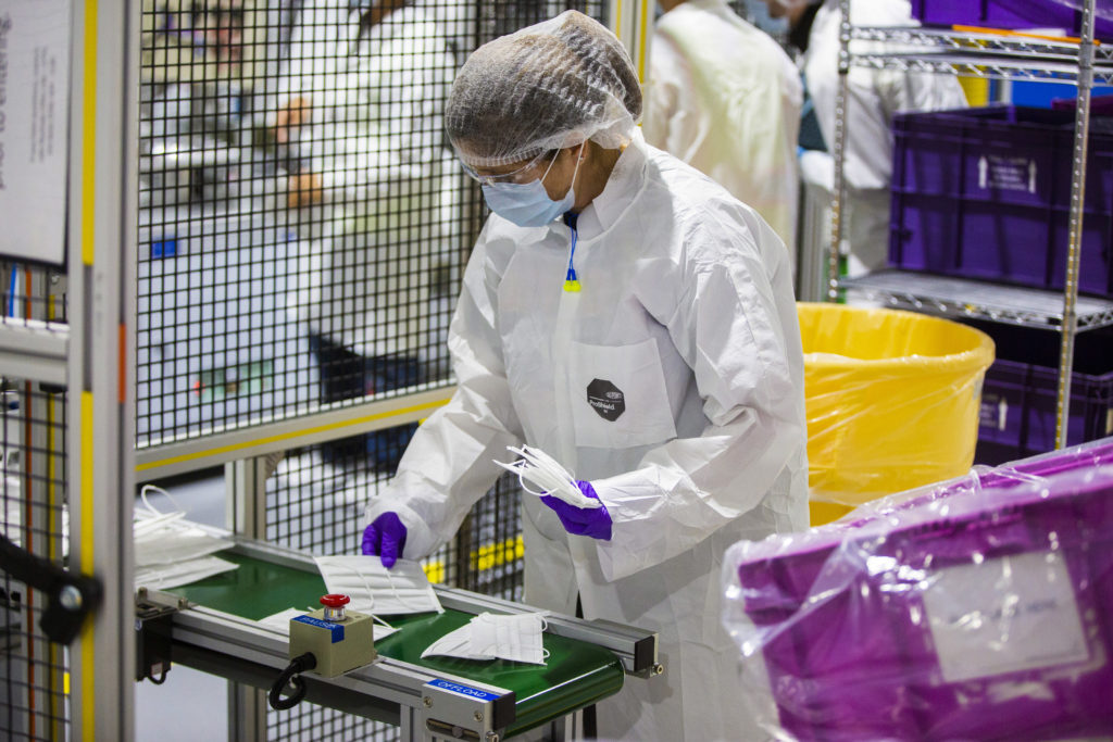 ford motor company produces face mask for essential workers safety amidst corona virus