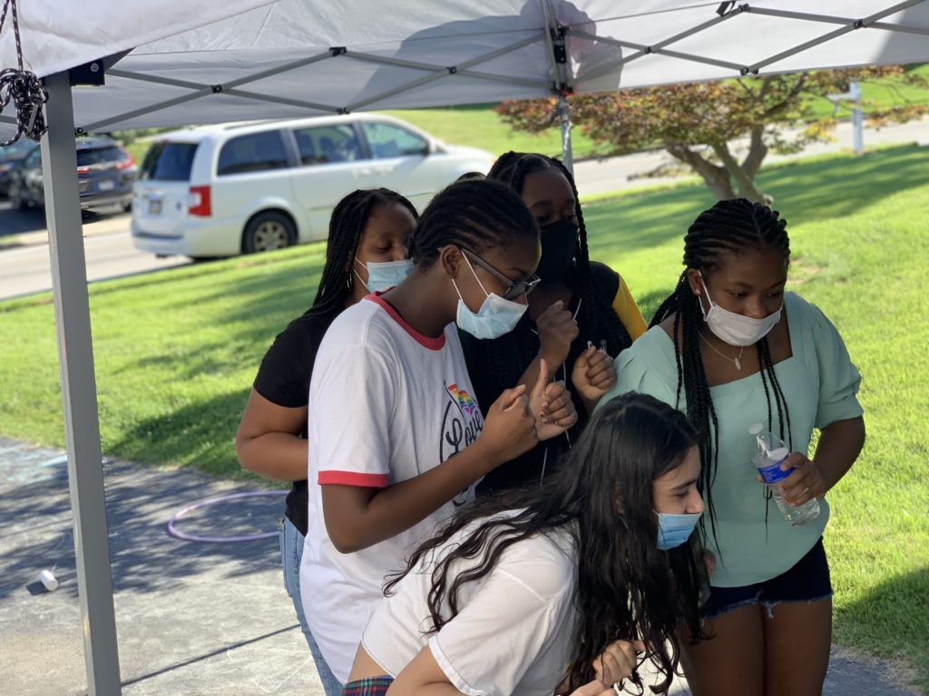 teen girls having fun coronavirus HPV Vaccinne Texas